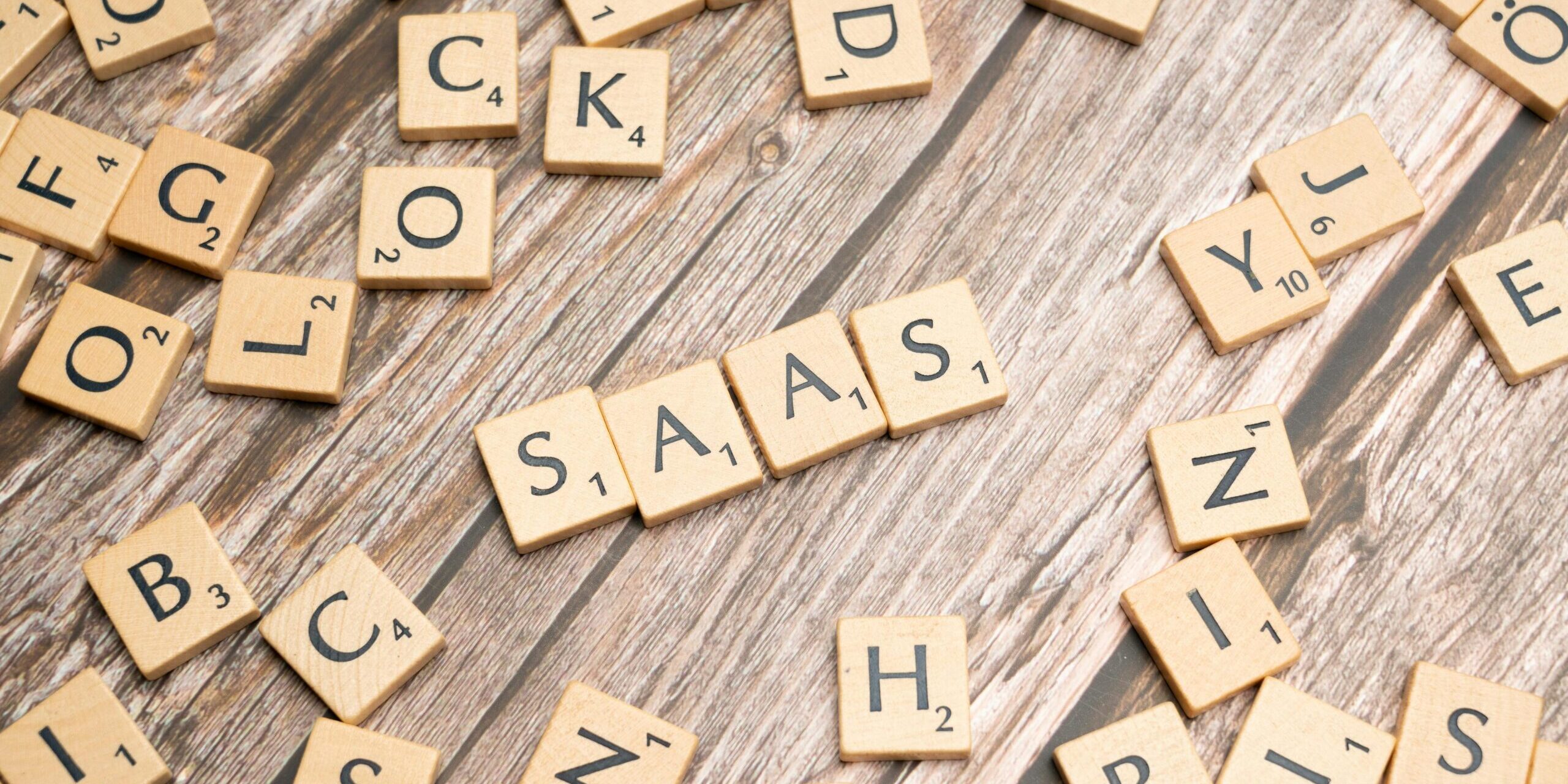 The-Smarter-Way-to-Vet-Your-SaaS-Integrations-scaled.jpg scrabble-letters-spelling-saas-on-a-wooden-tabl
