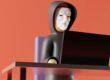 hacker typing on a laptop lego style